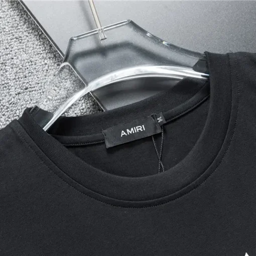 AM Staggered Logo T-shirt in Black - 279 - ami0000279 - Image 14