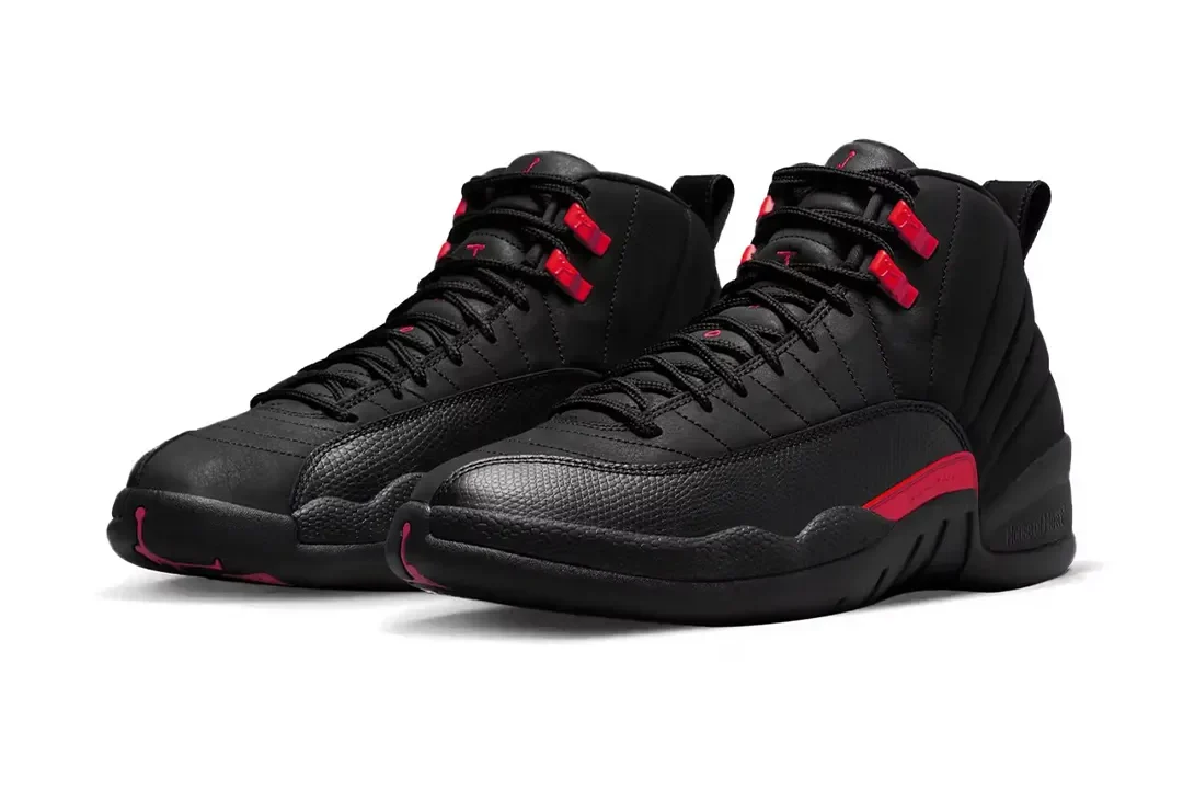 Jordan 12 Bloodline in black and varsity red, displayed on a clean white background.