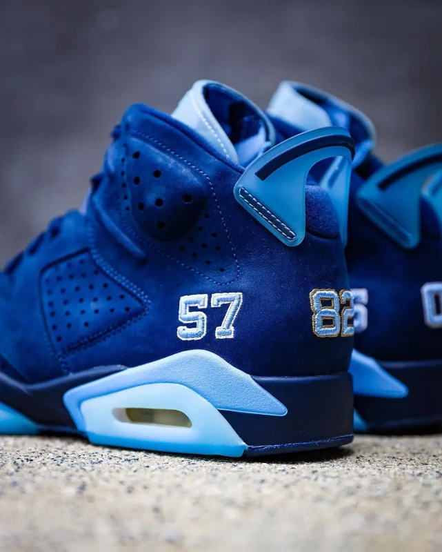 Side close-up of Jordan 6 UNC PE "Six Championships" highlighting suede texture and stitching