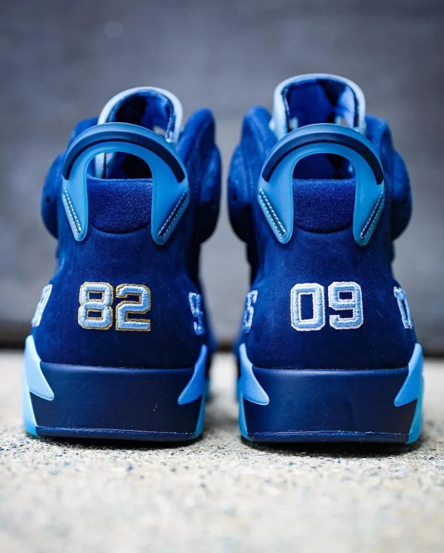 Back view of Jordan 6 UNC PE "Six Championships" with embroidered numbers on heel