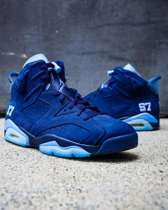 Front view of Jordan 6 UNC PE "Six Championships" sneaker with UNC blue and white colorway