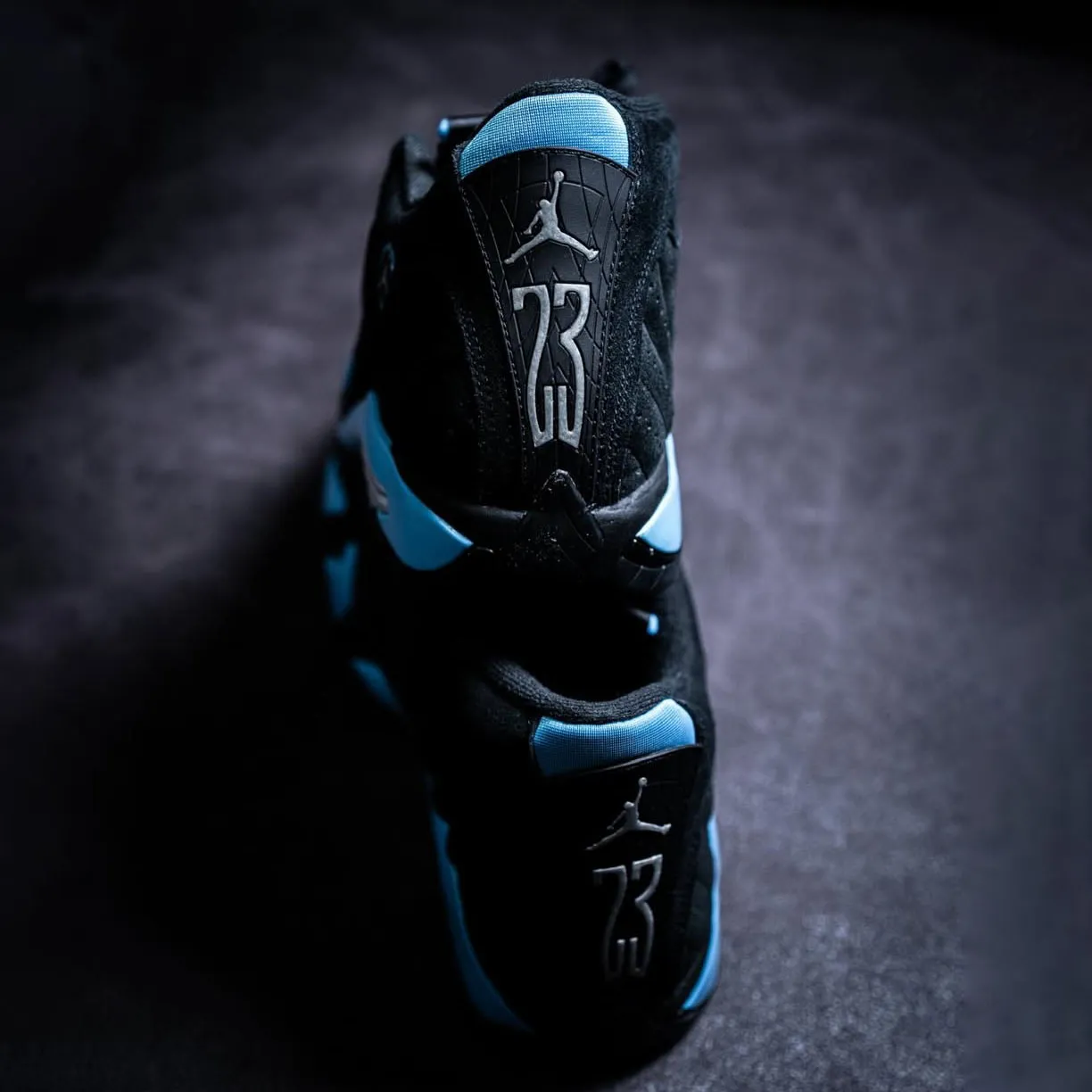 JORDAN 14 BLACK UNIVERSITY BLUE