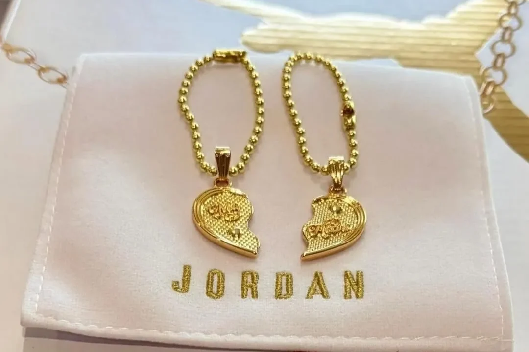 A hangtag name (My Heart) with the "Mother's Day" Jordan 11 Low sneakers