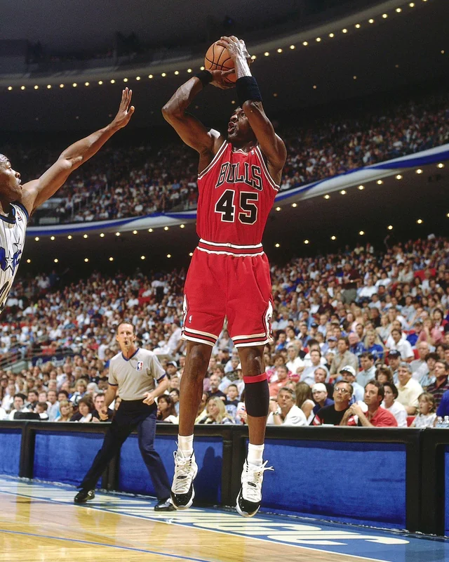 Michael Jordan wearing Concord 11 sneakers with No. 45 jersey