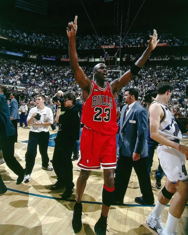 MJ celebrating sixth NBA championship after 1998 Finals